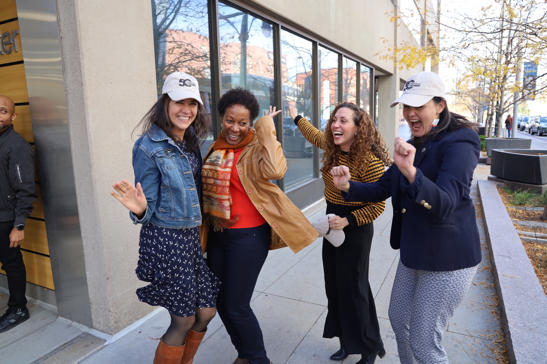 Dorothy and faculty happy dance tenure