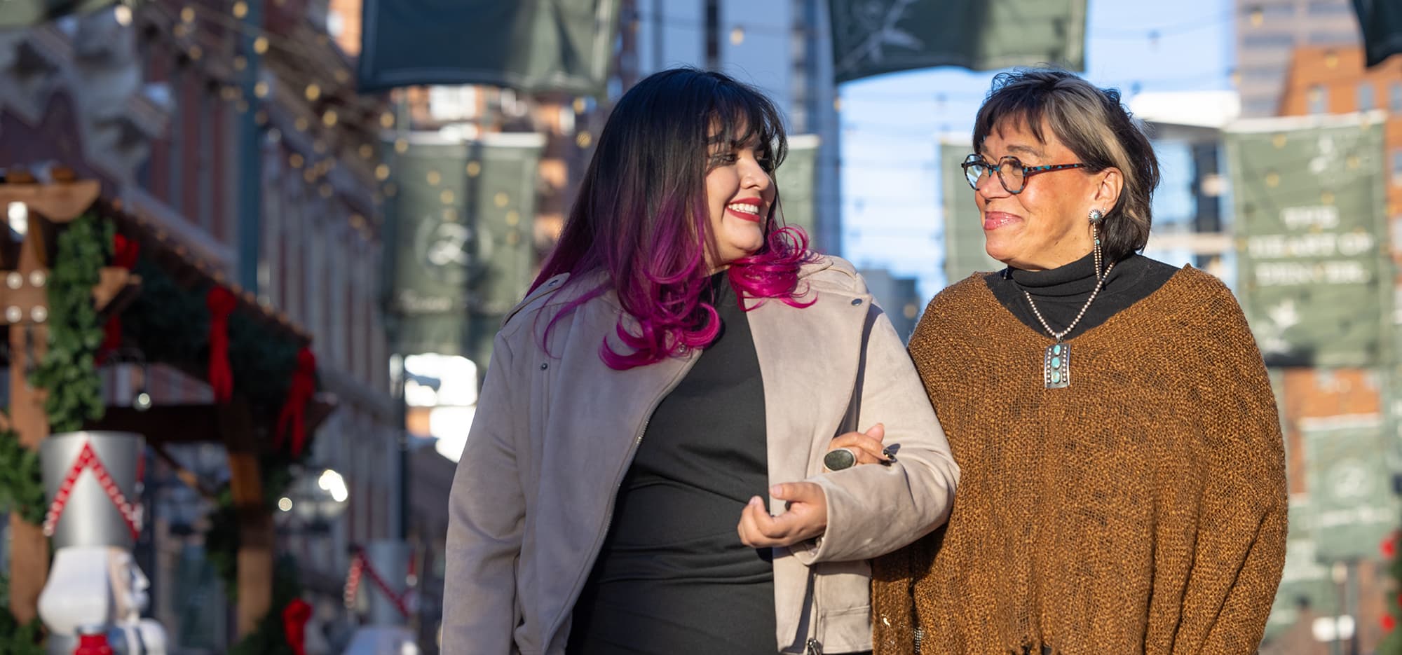 Dr. Margarita Bianco and Joselyne Garcia-Moreno walking in Larimer Square near CU Denver.