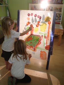 PlexiPaint Students paint at Boulder Journey School